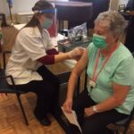 A person getting a covid vacccine