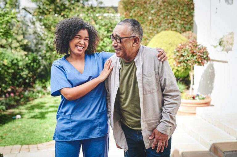 senior walking with nurse