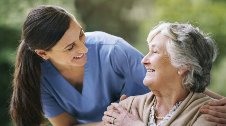 Shot of a senior woman in a wheelchair being cared for a nurse