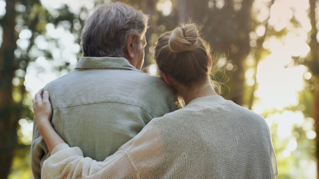 Hugging lovingly in the park